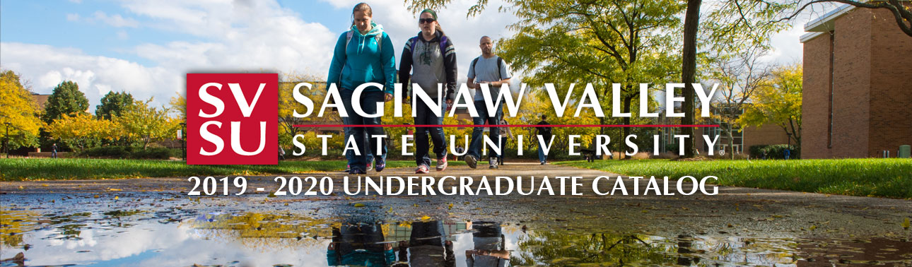 Saginaw Valley State University students walking in autumn